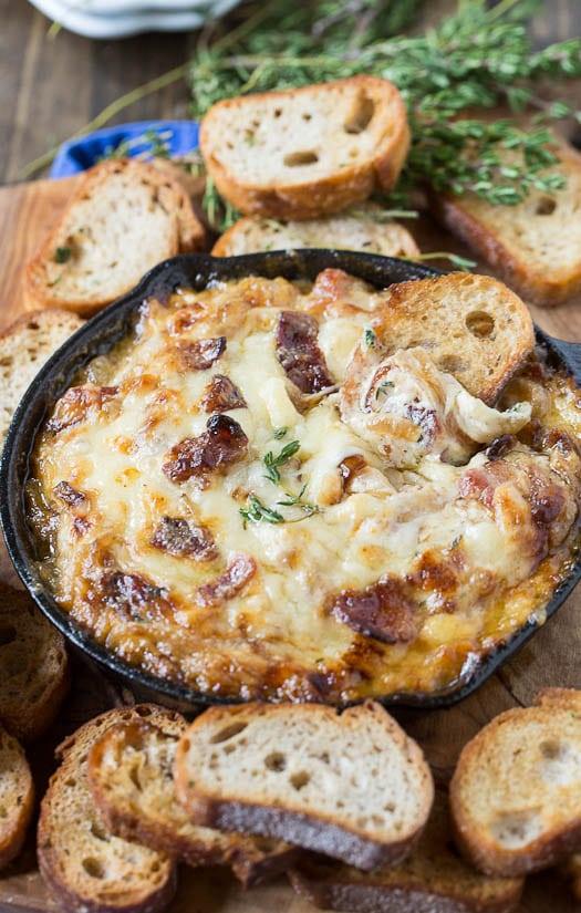 Hot Caramelized Onion Dip with Bacon and Gruyere and baguette slices.