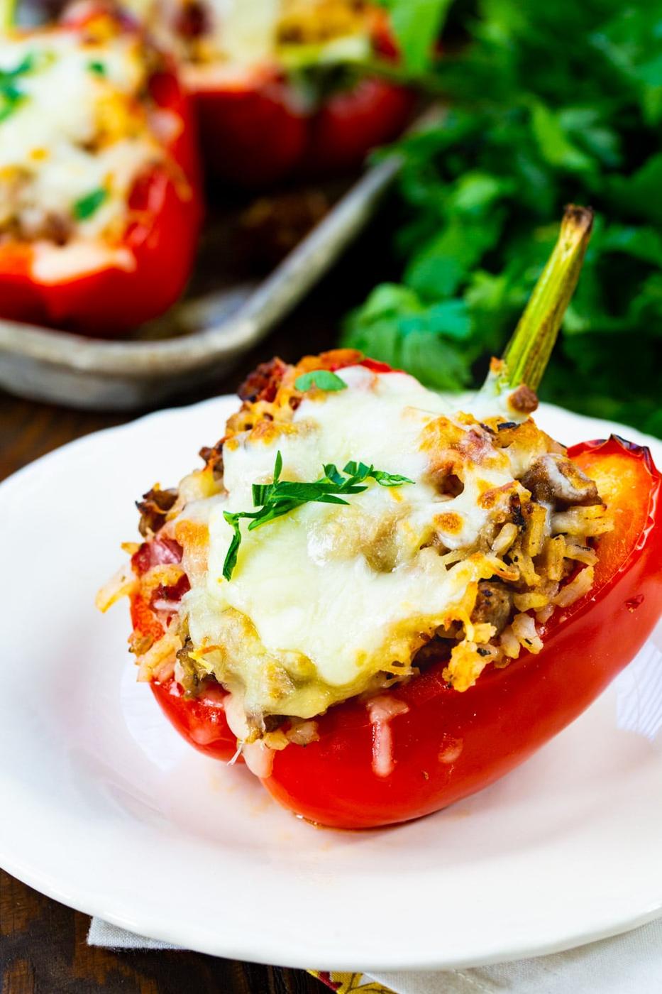 One Italian Sausage Stuffed Pepper on a plate.