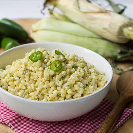 Jalapeno Creamed Corn in white serving bowl.