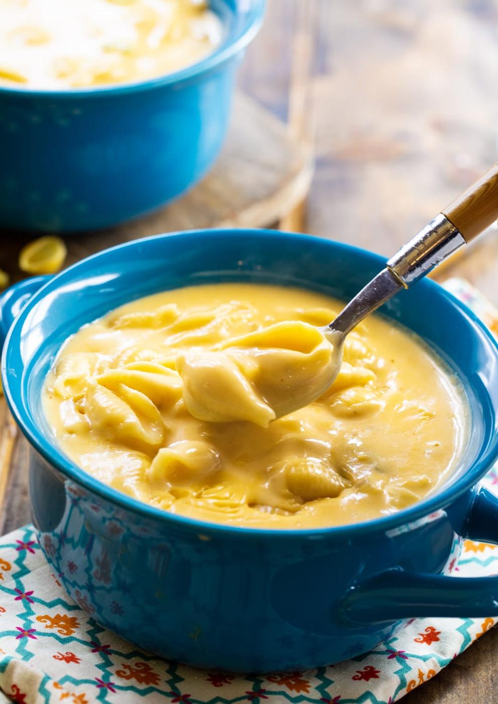 Spoon scooping a bite of soup.