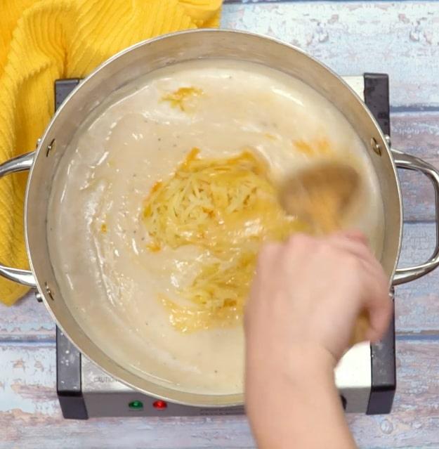 Adding the cheese.