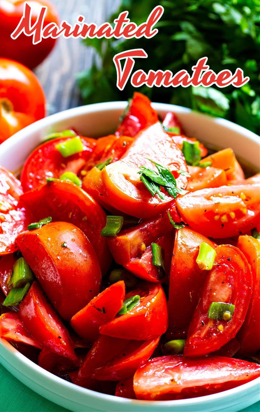 Marinated Tomatoes in a white bowl.