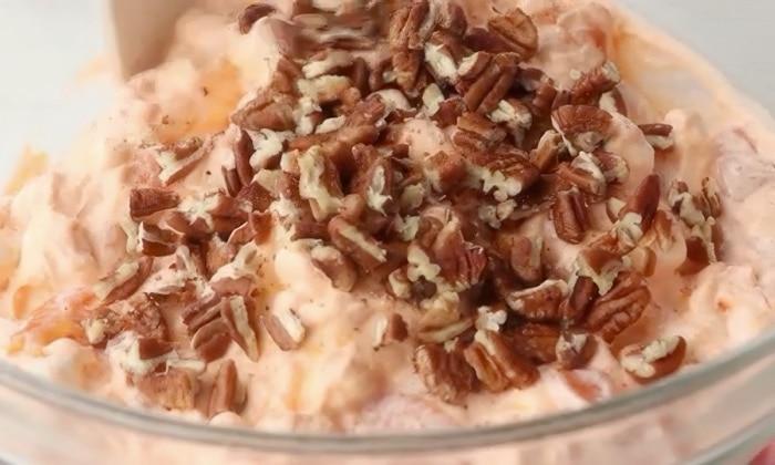 Adding the pecans.