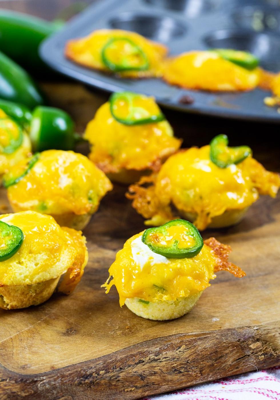 Corn Muffins on wood serving board.