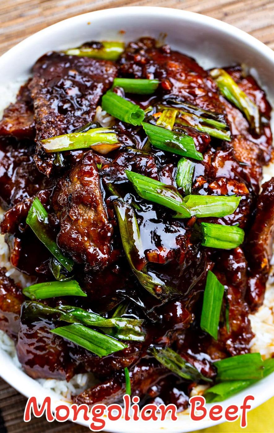 Mongolian Beef over white rice in bowl.