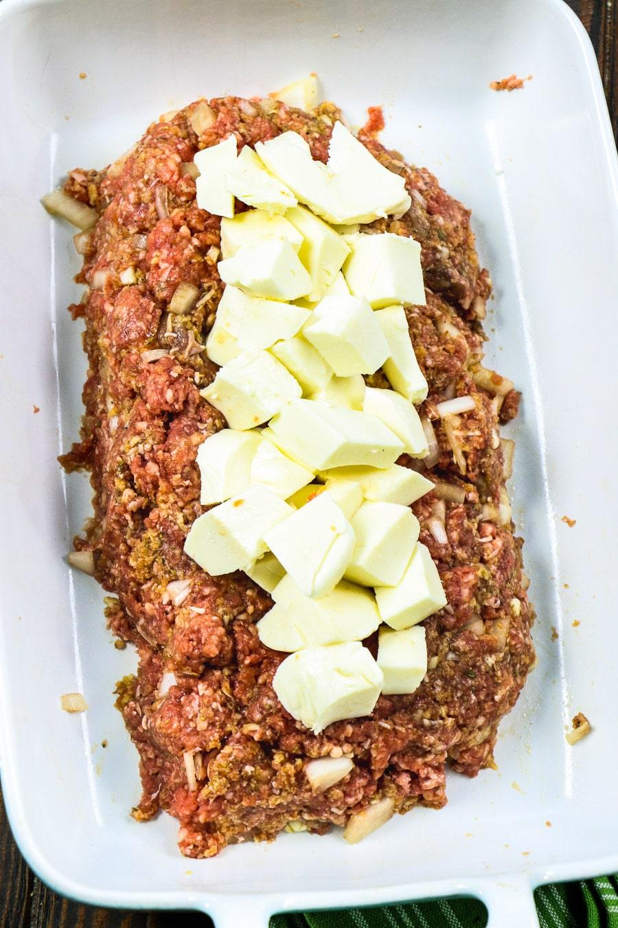 Top ground beef mixture with diced mozzarella.