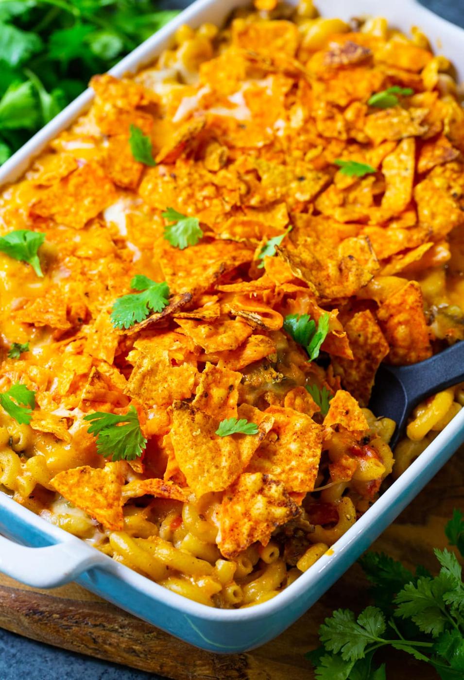 Spoon scooping Nacho Mac and Cheese.