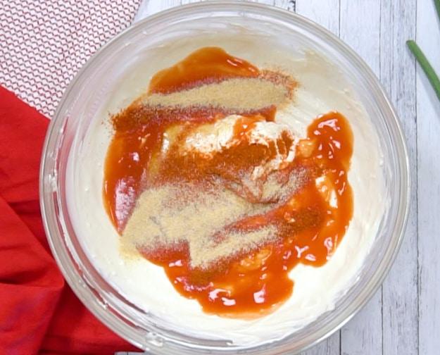 Other ingredients added to cream cheese mixture.