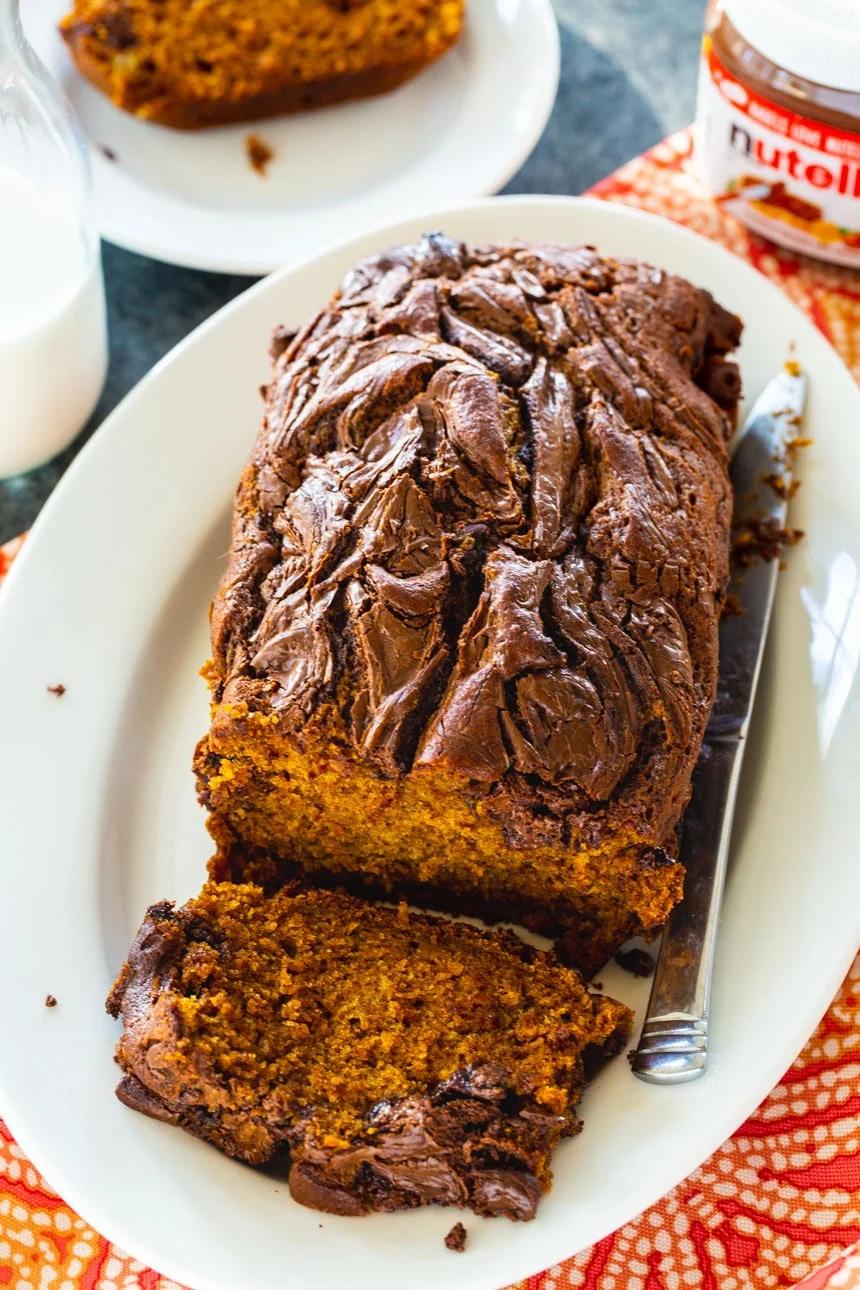 Overhead of Pumpkin Nutella Bread with a slice cut.