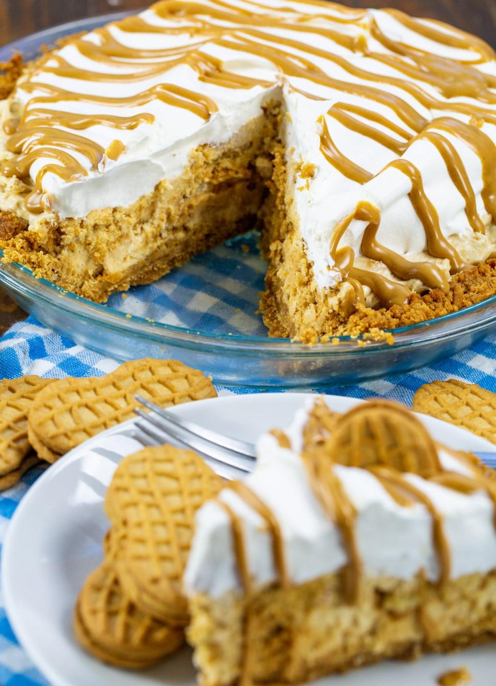 Nutter Butter Pie with a slice cut out.