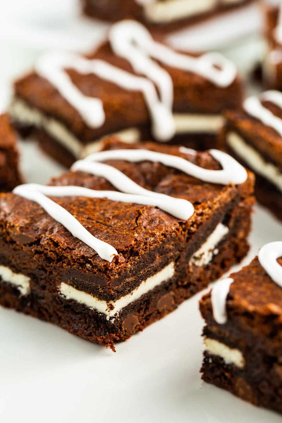 Oreo Brownies arranged on a plate.