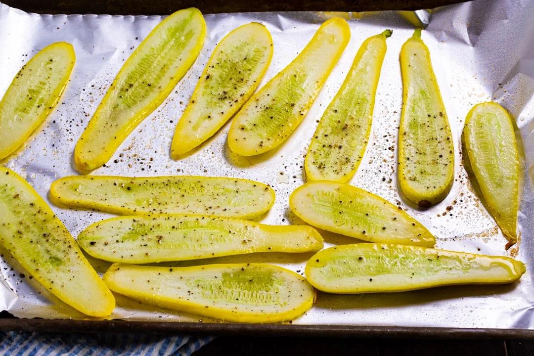Squash slices on baking sheet.