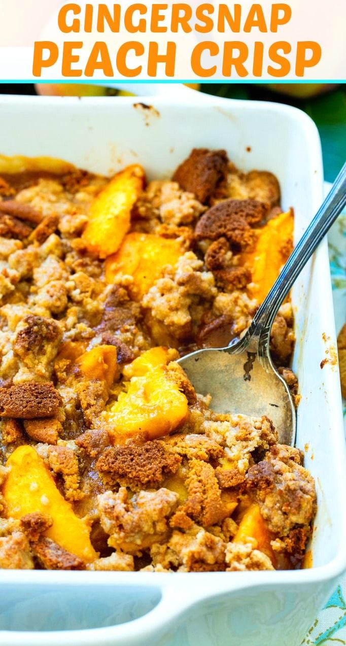 Peach Gingersnap Crisp being scooped with a spoon