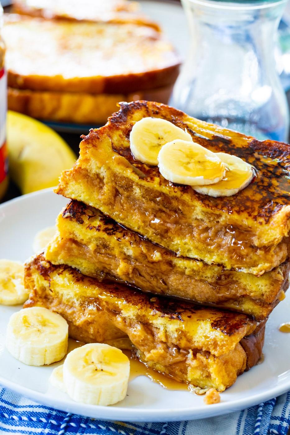 French Toast stuffed with peanut butter on a plate.