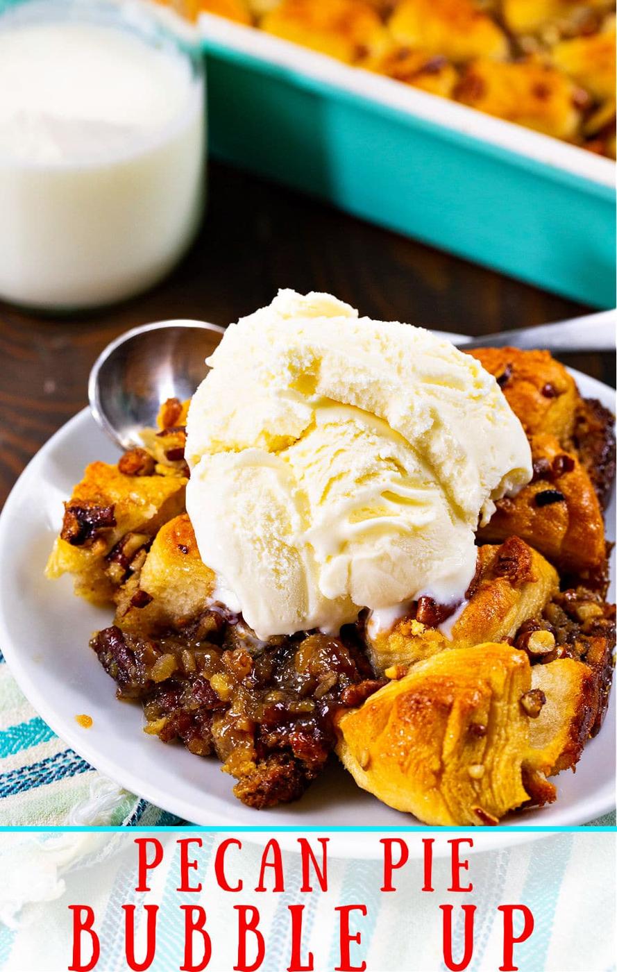 Pecan Pie Bubble Up dished up on a plate with vanilla ice cream.