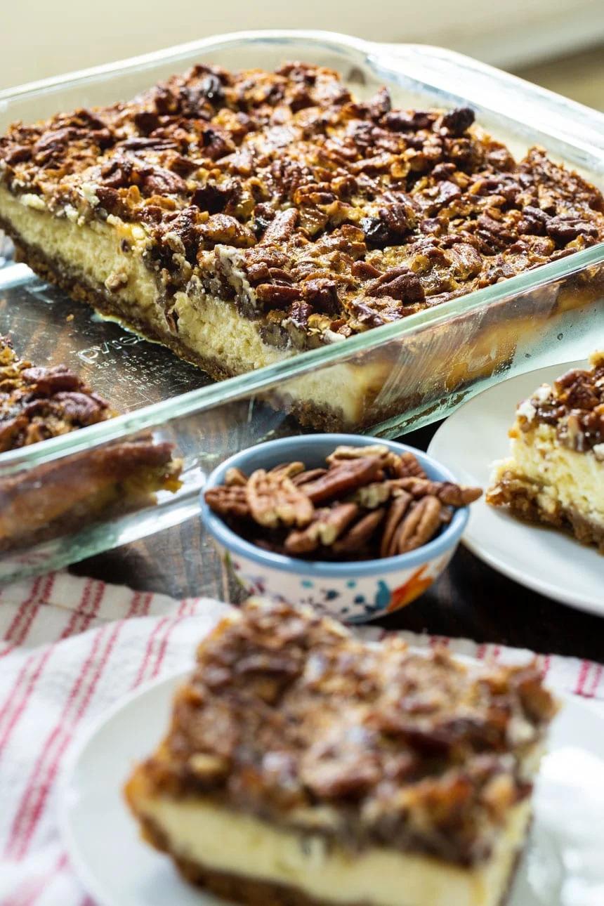 Pecan Pie Cheesecake Bars in a baking dish.