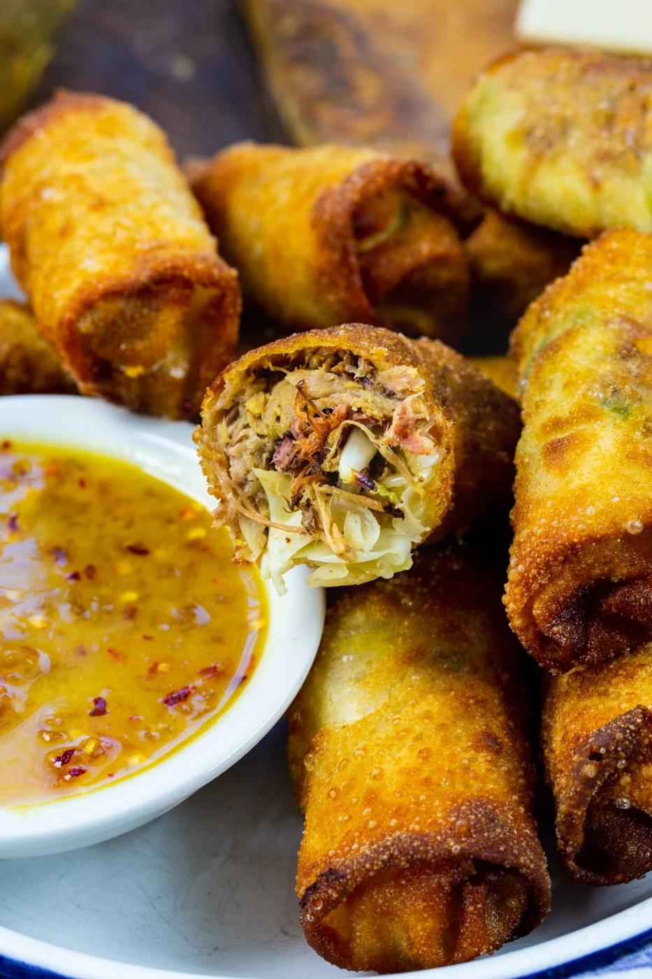 Egg roll cut in half to show inside.