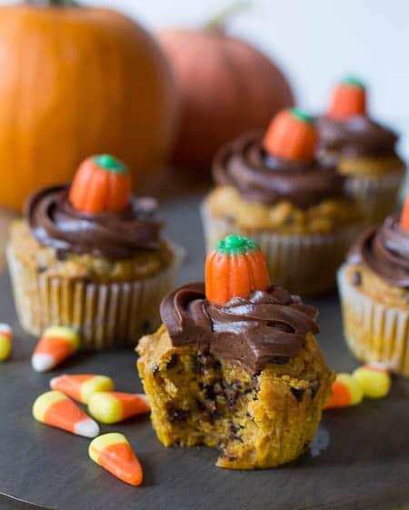 Pumpkin Cupcake with a bite bit out.