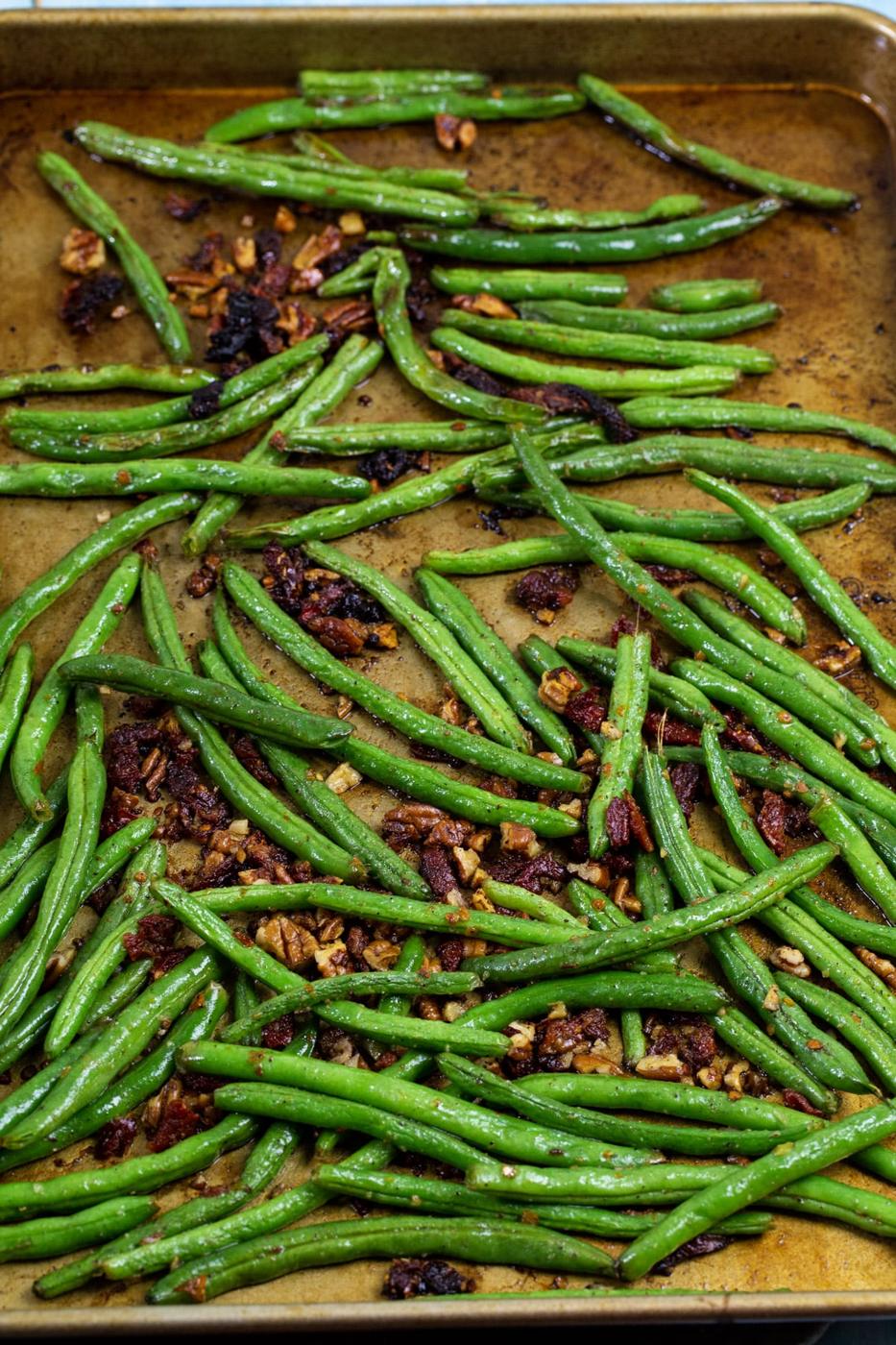 Green beans on a baking sheet.