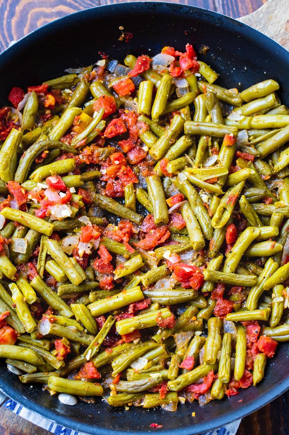 Finshed green beans in a nonstick skillet.