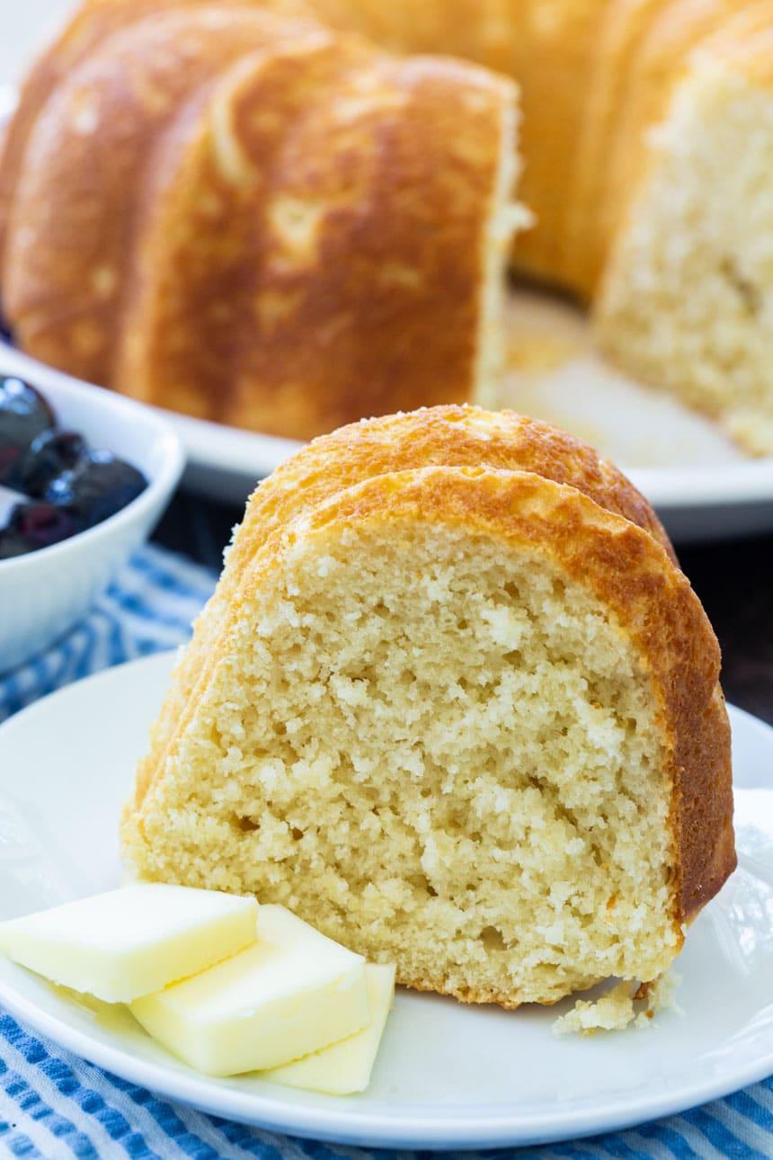 Slice of Sally Lunn Bread on a plate with butter