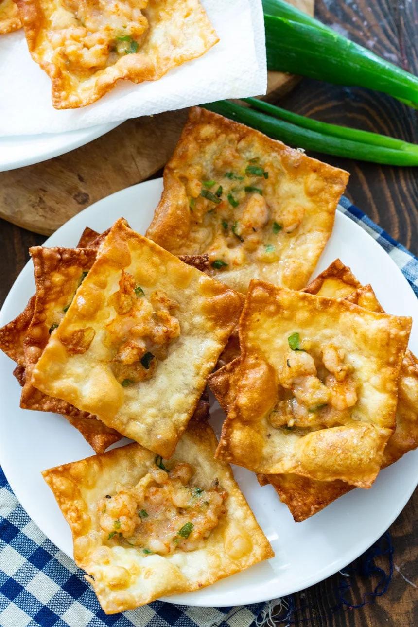 Wonton Chips piled up on a plate.