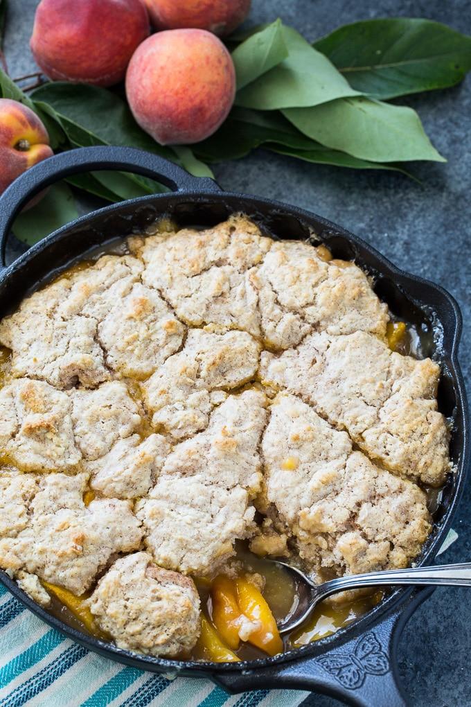 Skillet Bourbon Peach Cobbler with Cinnamon Sugar Dumpling