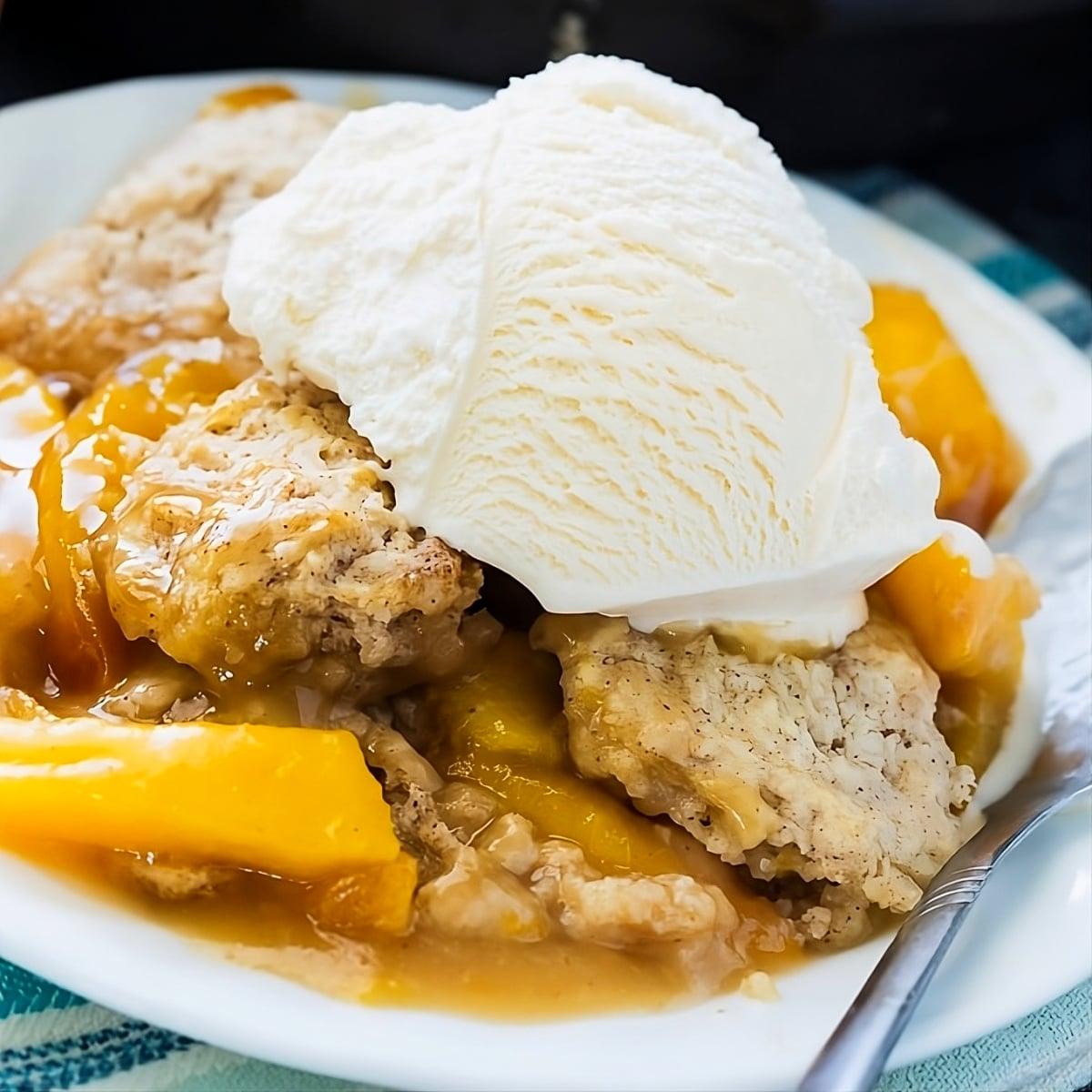 Skillet Bourbon Peach Cobbler with Cinnamon Sugar Dumplings