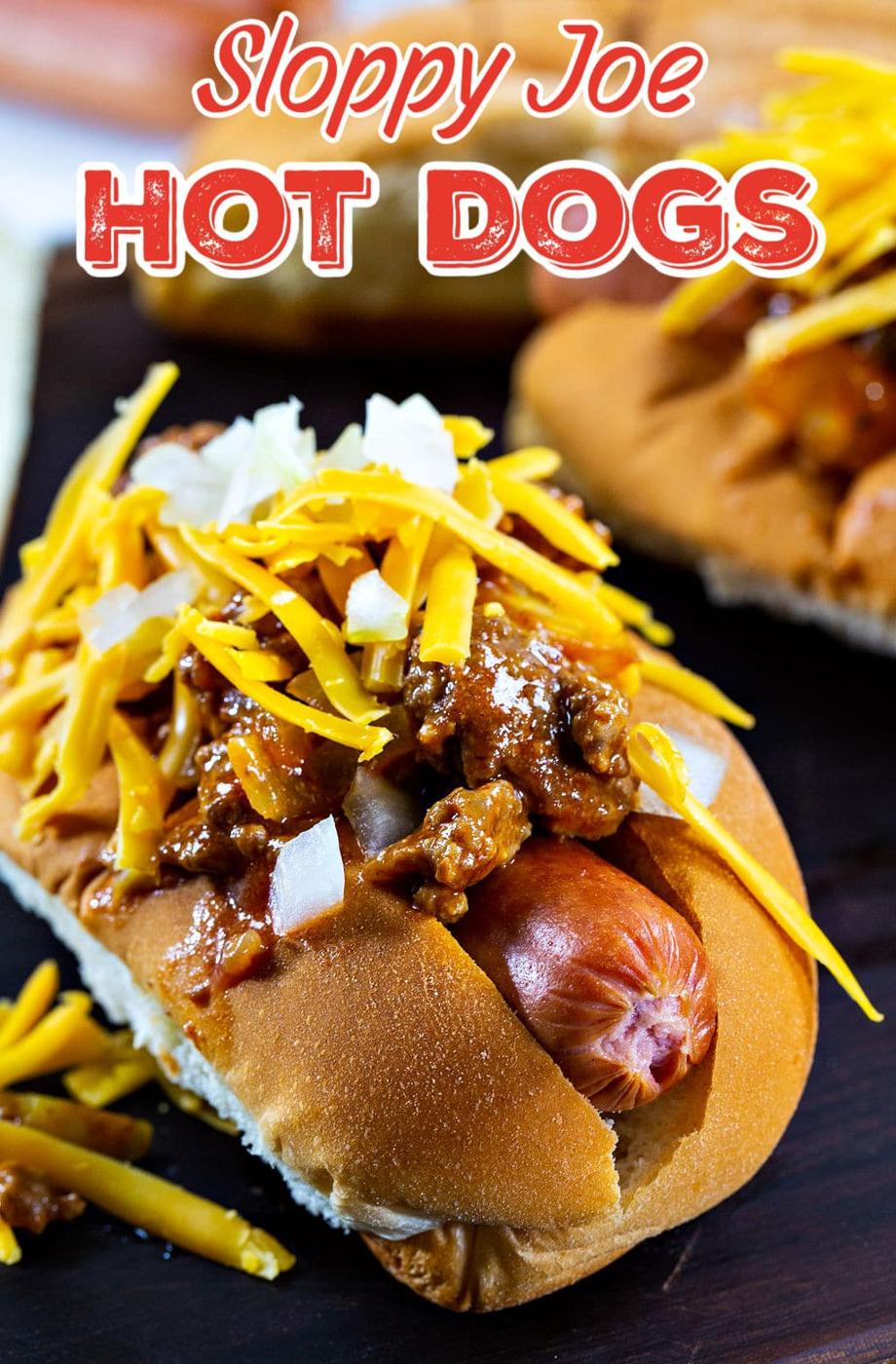 Sloppy Joe Hot Dog topped with shredded cheddar cheese and onion.
