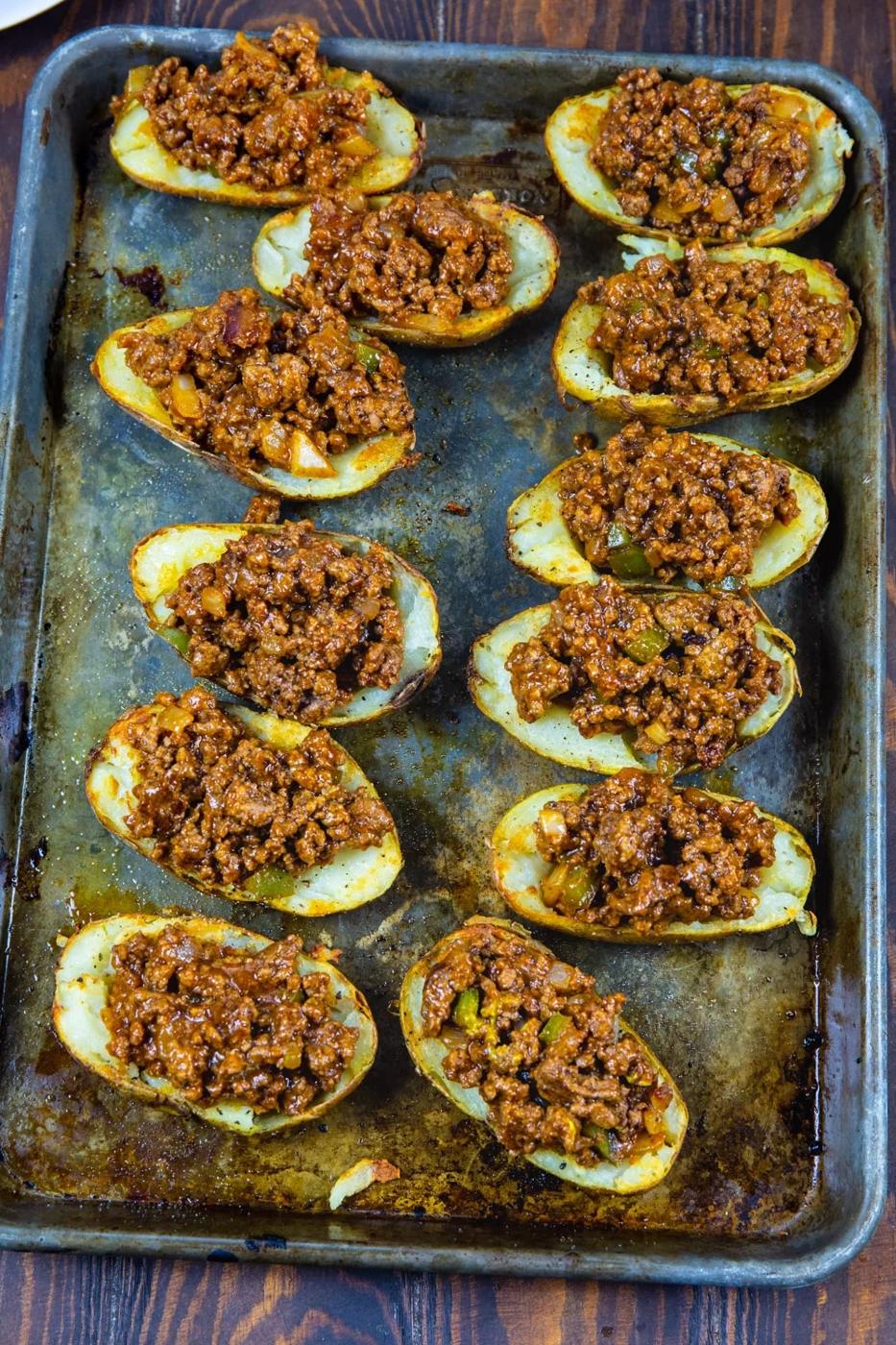 Potato halves filled with sloppy joe mixture.