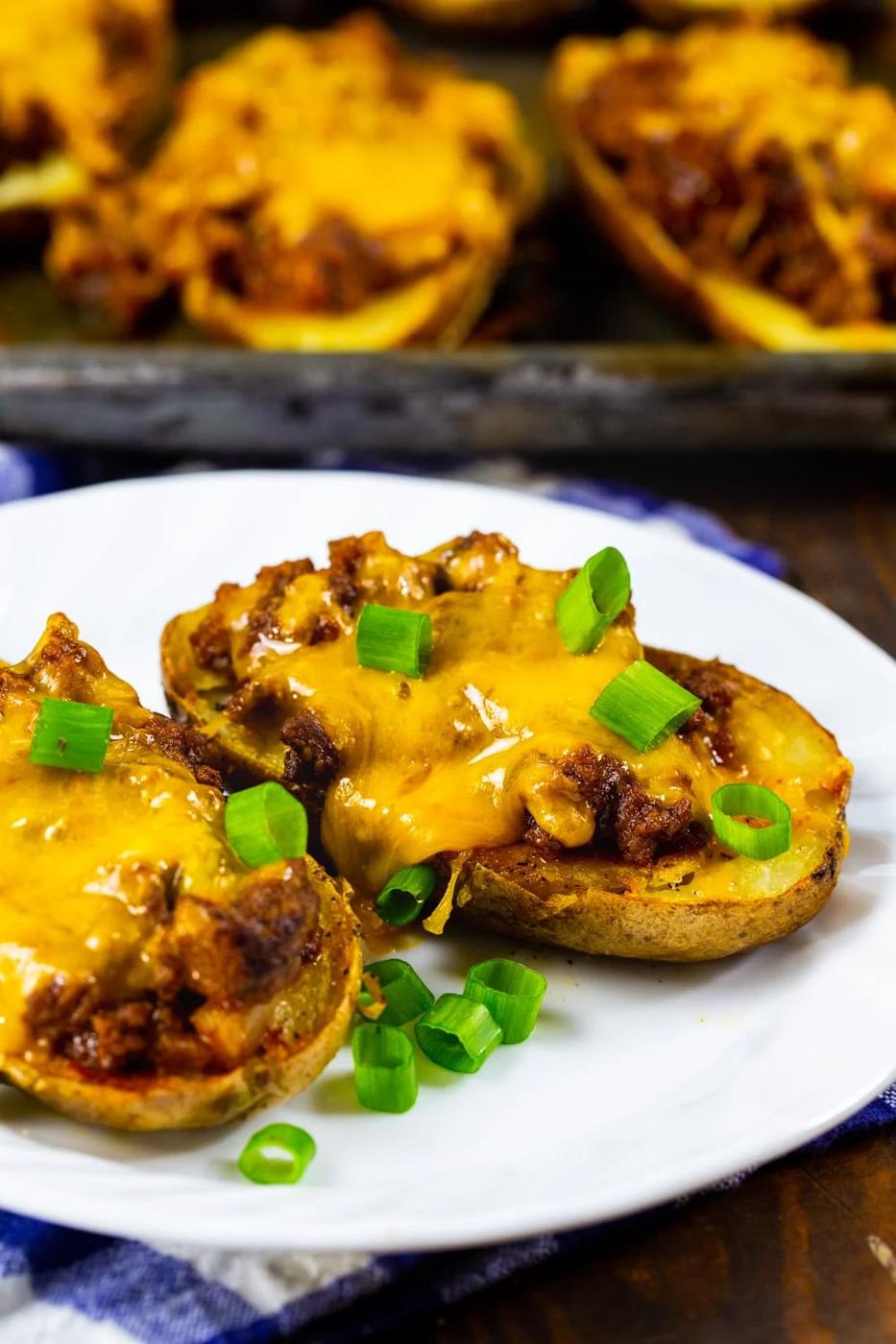 Two Sloppy Joe Potato Skins on a plate.