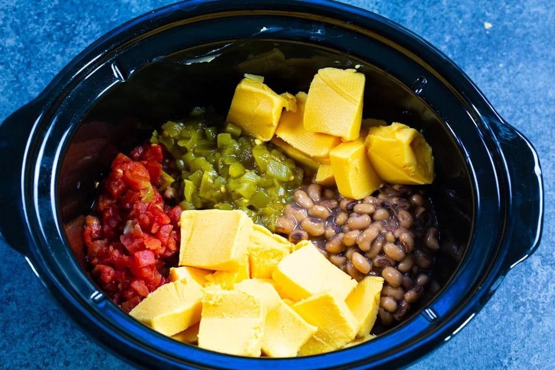 Ingredients for dip in slow cooker.