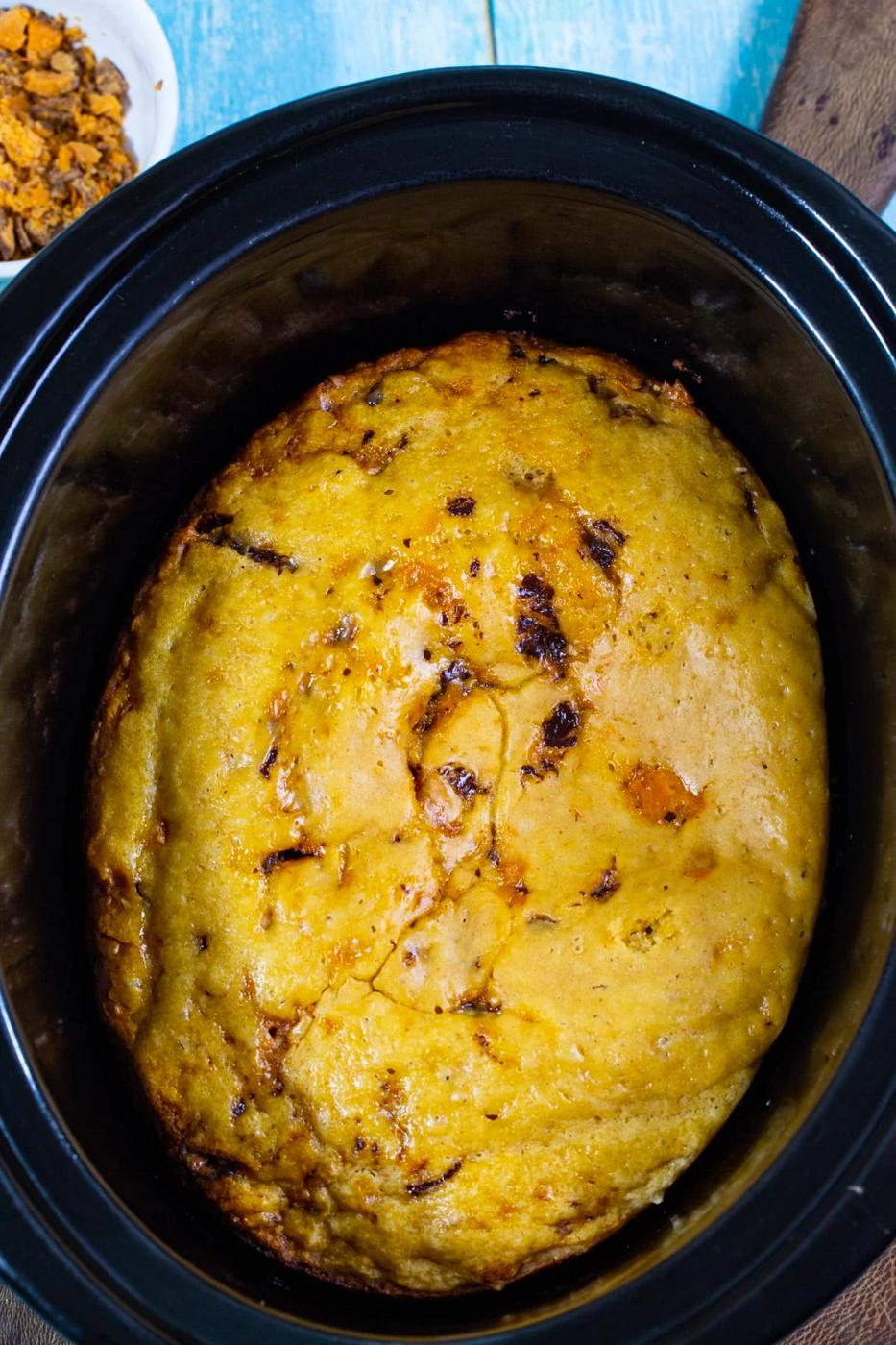 Unfrosted cake in slow cooker.