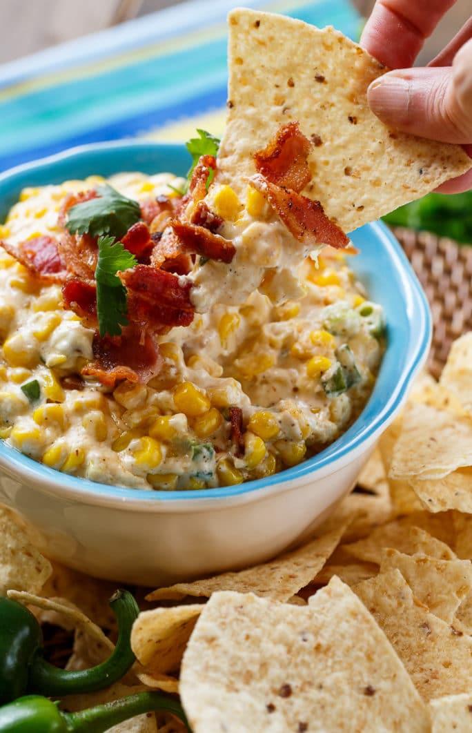Slow Cooker Corn Dip. Dump all ingredeints in the crock pot and 2 hours later you have a warm and creamy dip.