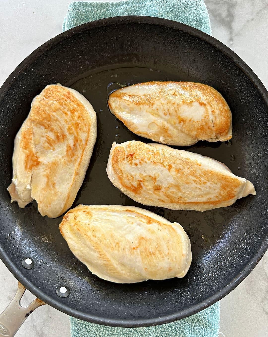 Chicken in nonstick skillet.