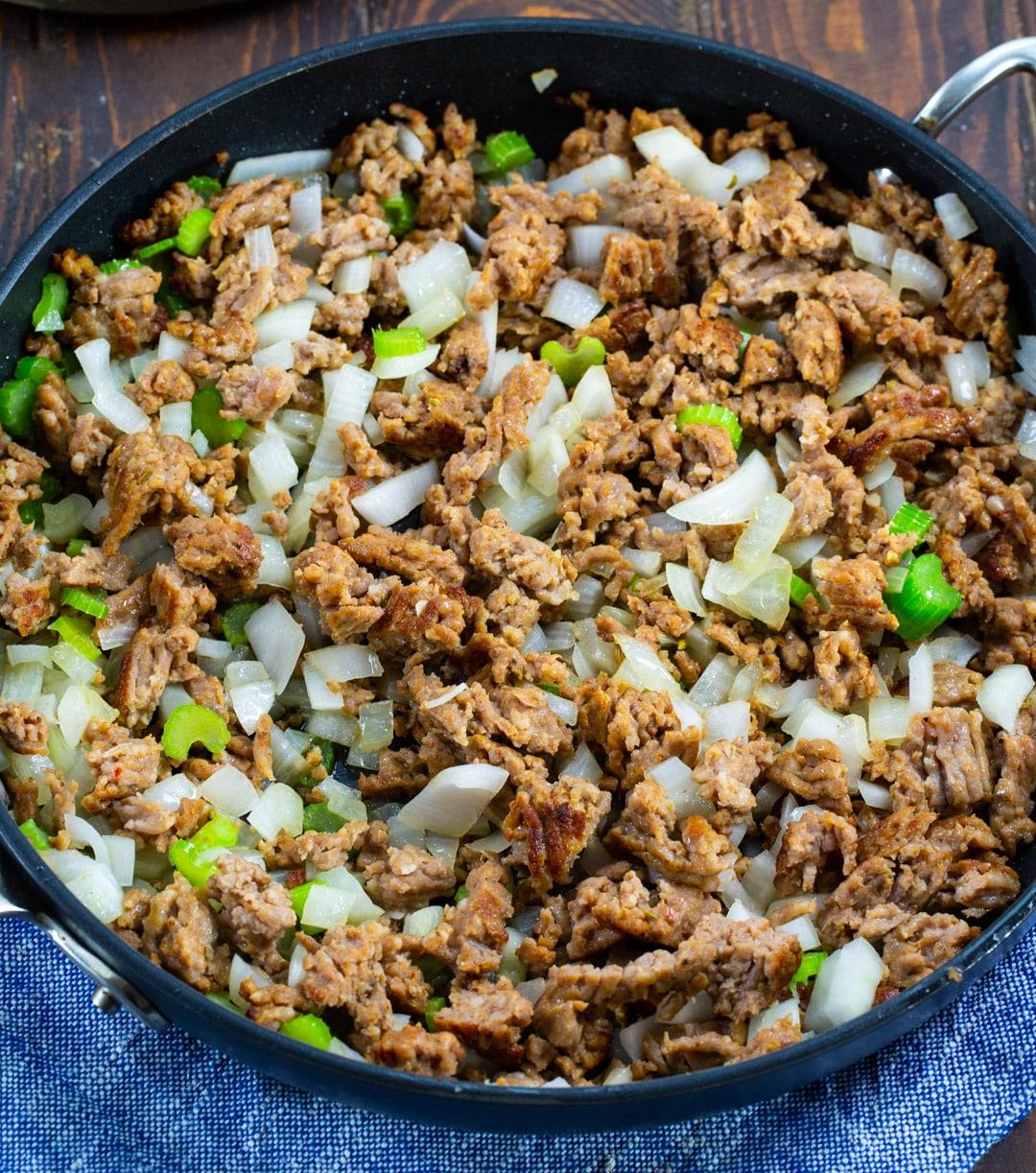 Sausage, onion, anad celery in skillet.