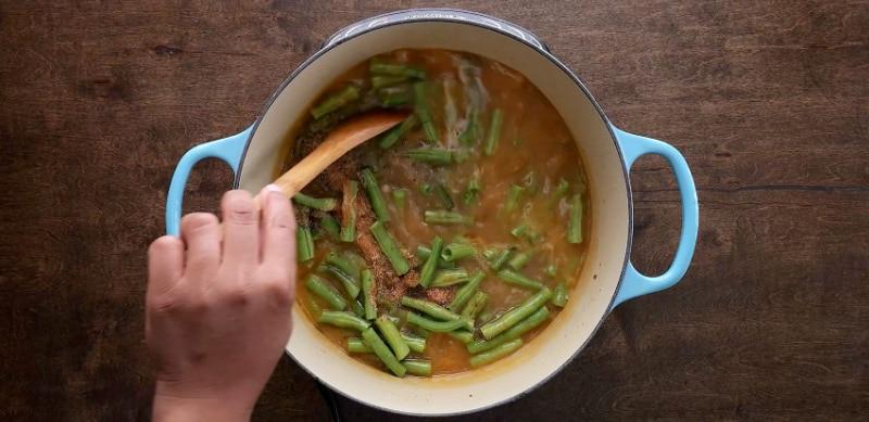 Green beans and seasonings added.