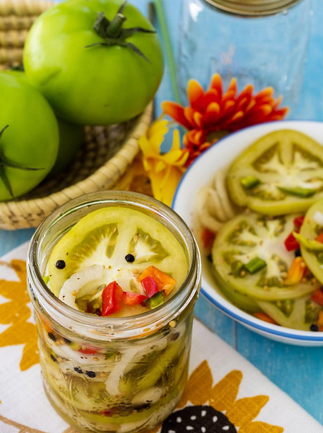 Pickled Green Tomatoes in a mason jar.