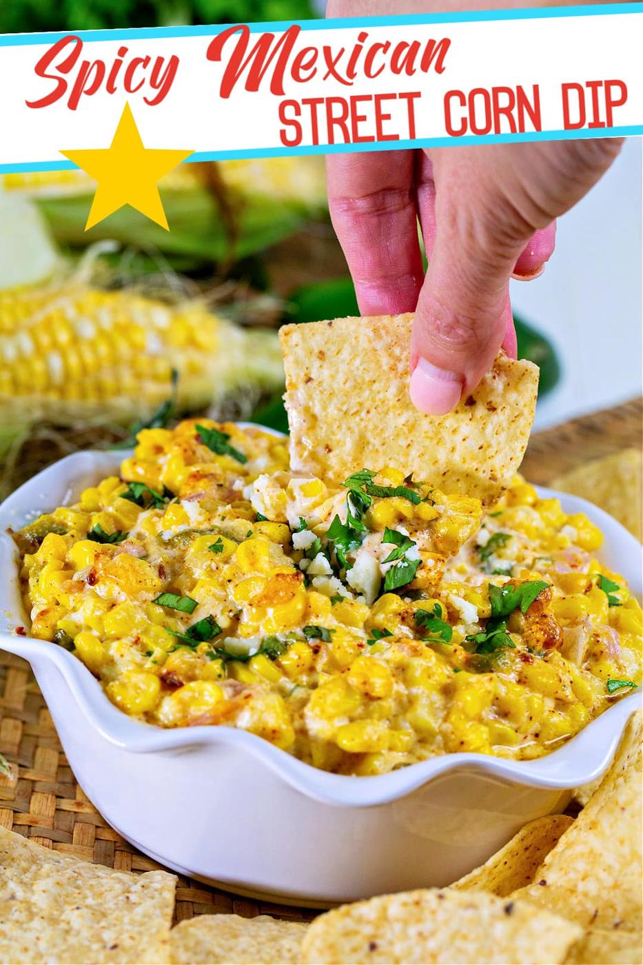 Chip getting dipped into corn dip.