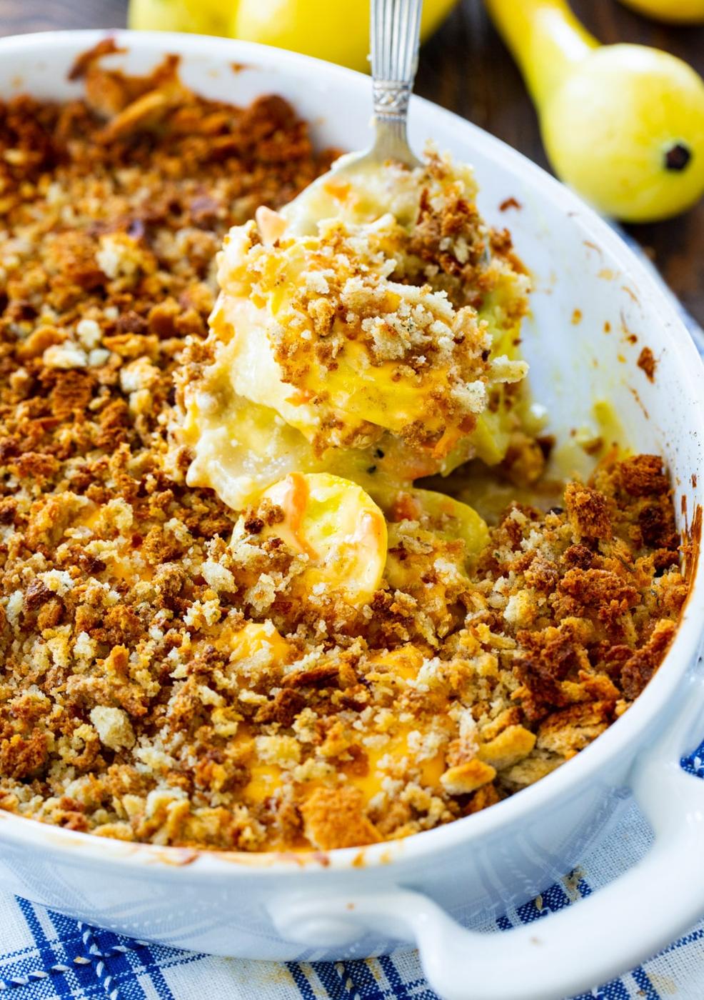 Spoon scooping Squash Casserole