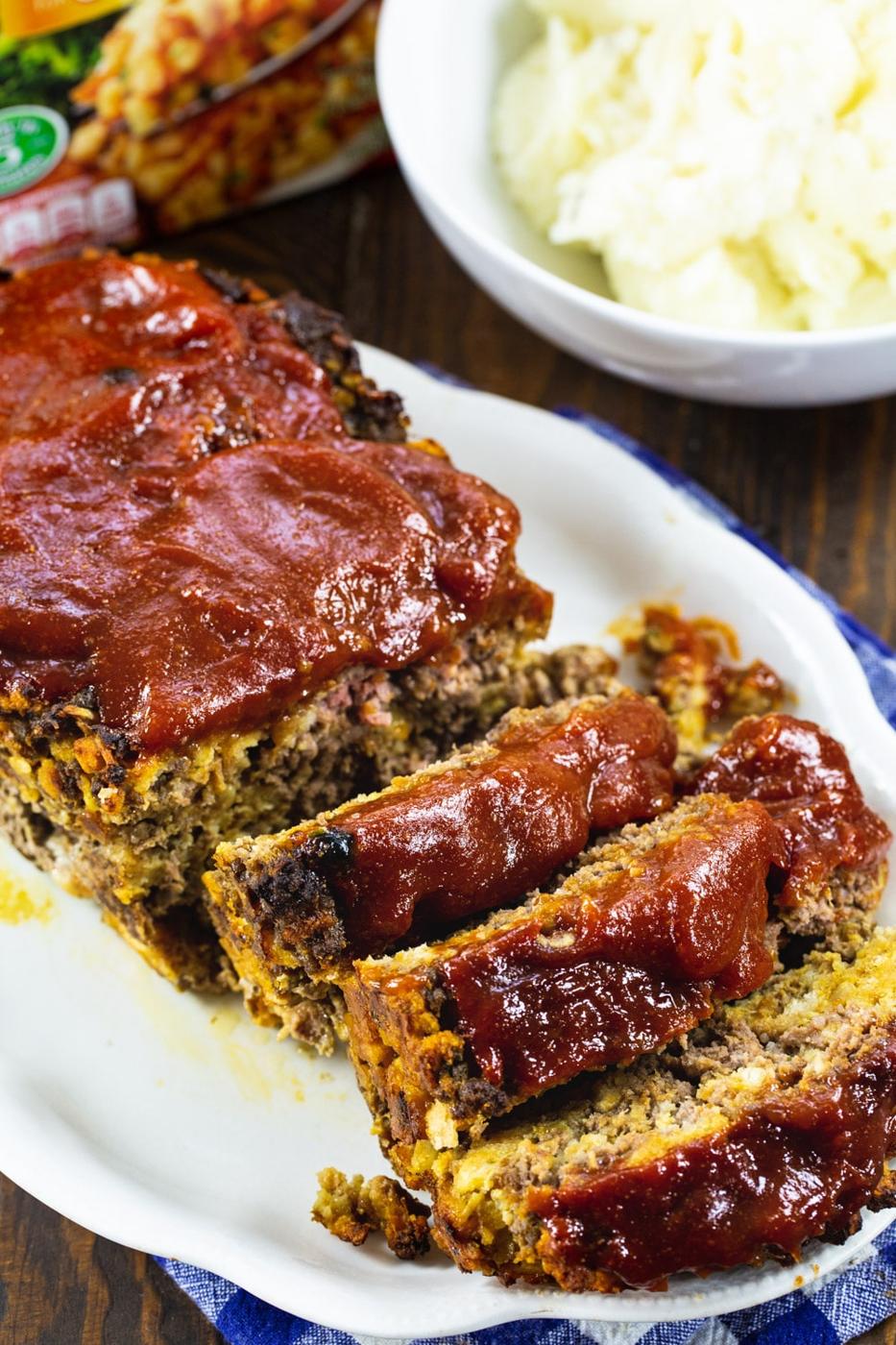 Stove Top Meatloaf cut into slices on a serving platter.