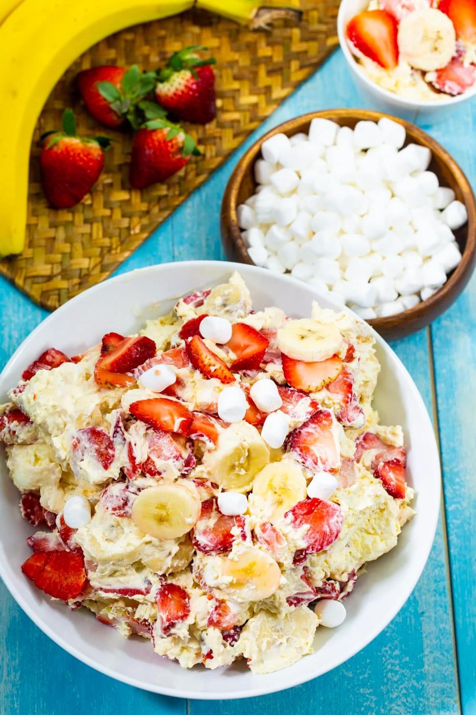 Cheesecake Salad in a bowl and a bowl full of marshmallows.