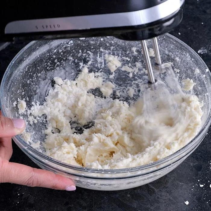 Mixing the frosting.