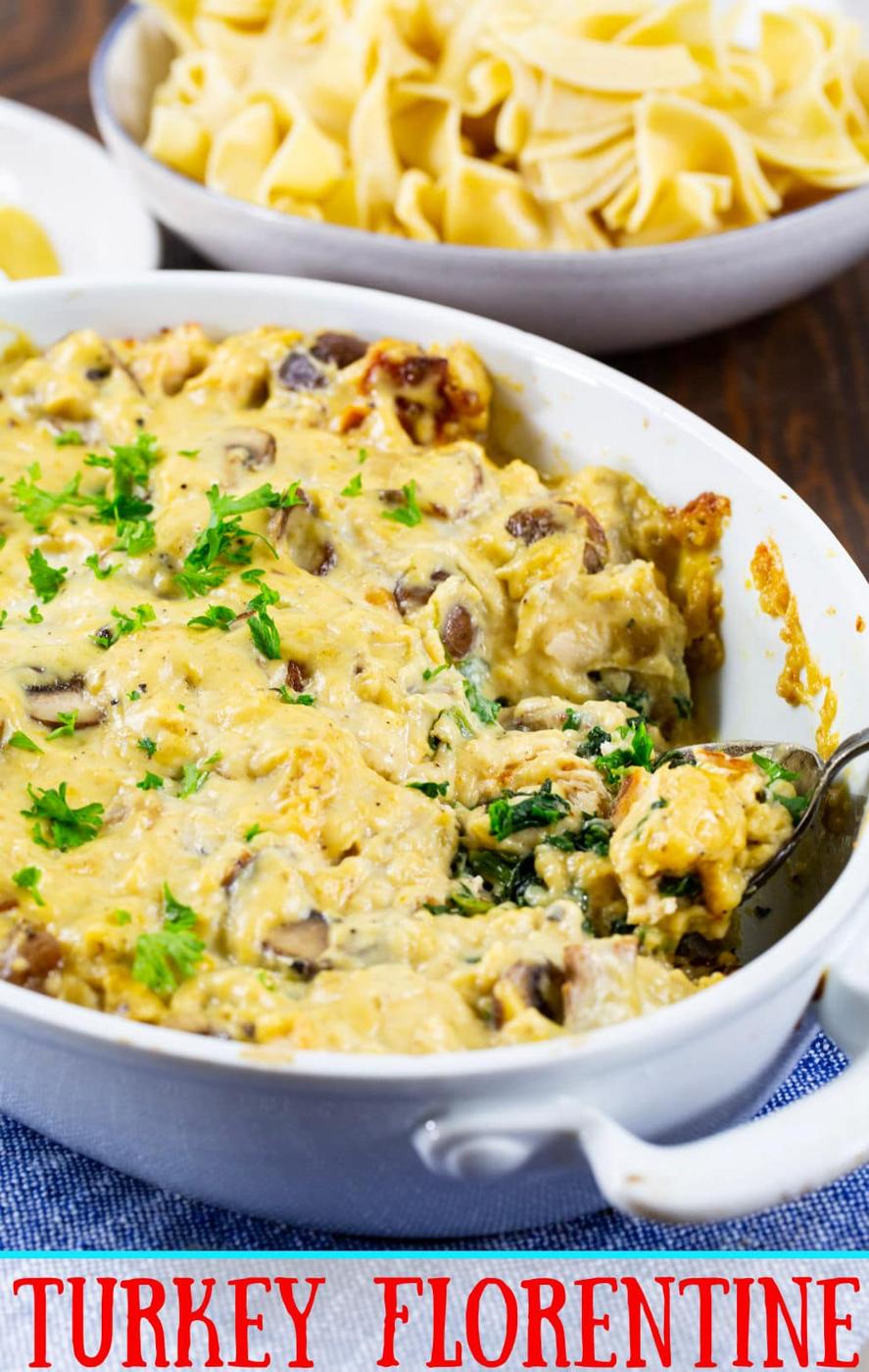 Spoon scopping Turkey Florentine out of casserole dish.