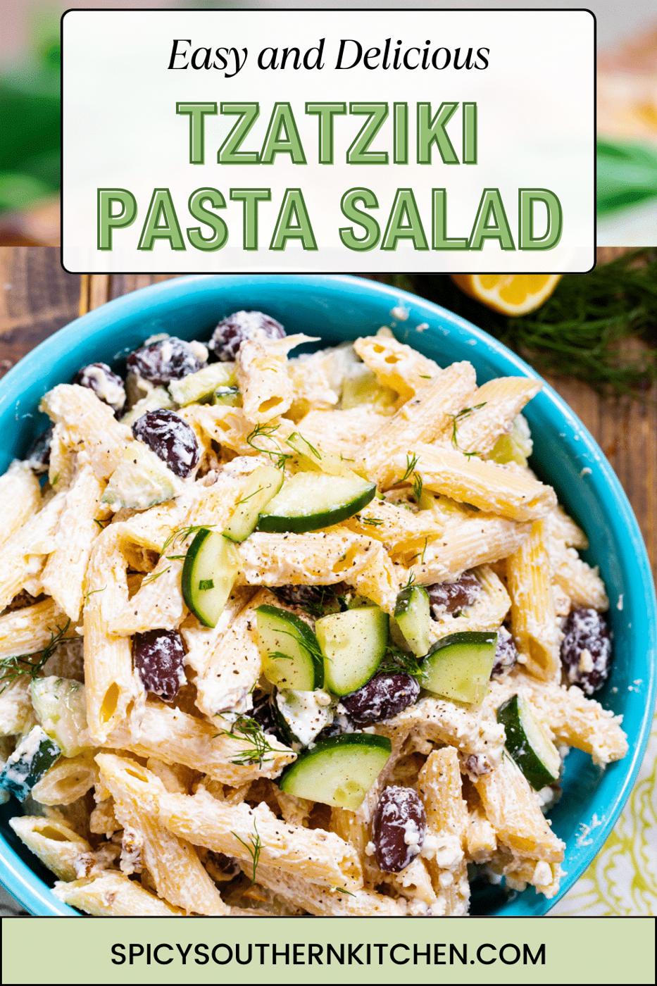 Pasta salad in a blue serving bowl.