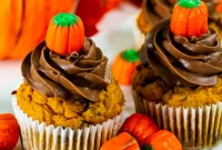 Decadent Pumpkin Chocolate Chip Cupcakes Crowned with Chocolate