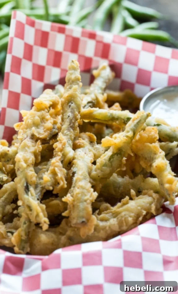 Crunchy Green Bean Fries 6 Batch of freshly fried green beans, showcasing their ideal crispy texture.