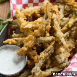 Crispy Fried Green Beans, double-dipped and seasoned to perfection.