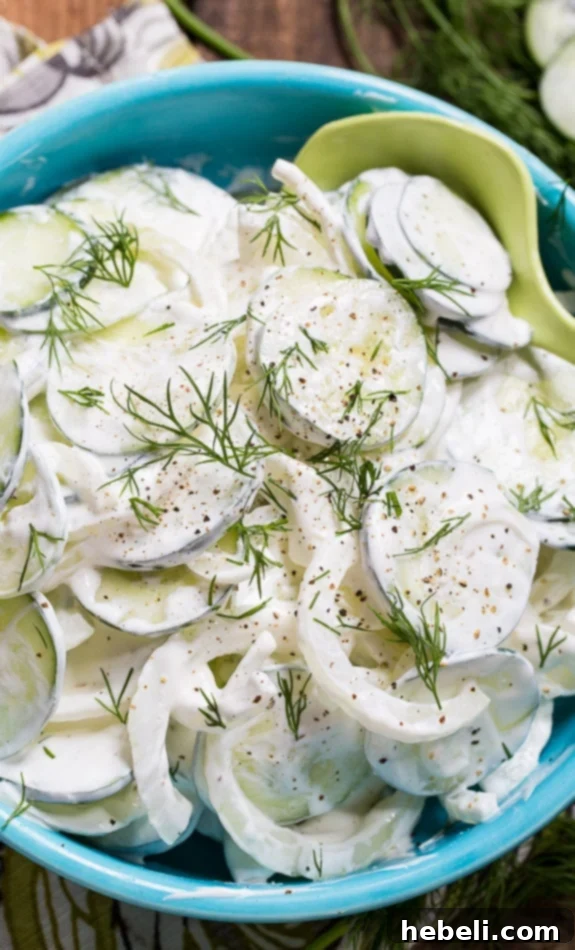 Cool, creamy, sweet, and tangy Southern Creamy Cucumbers are a refreshing addition to any summer meal, made lighter with SPLENDA®.