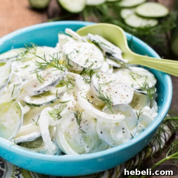 Southern Creamy Cucumbers, a cool and satisfying side dish, perfect for warm weather gatherings.